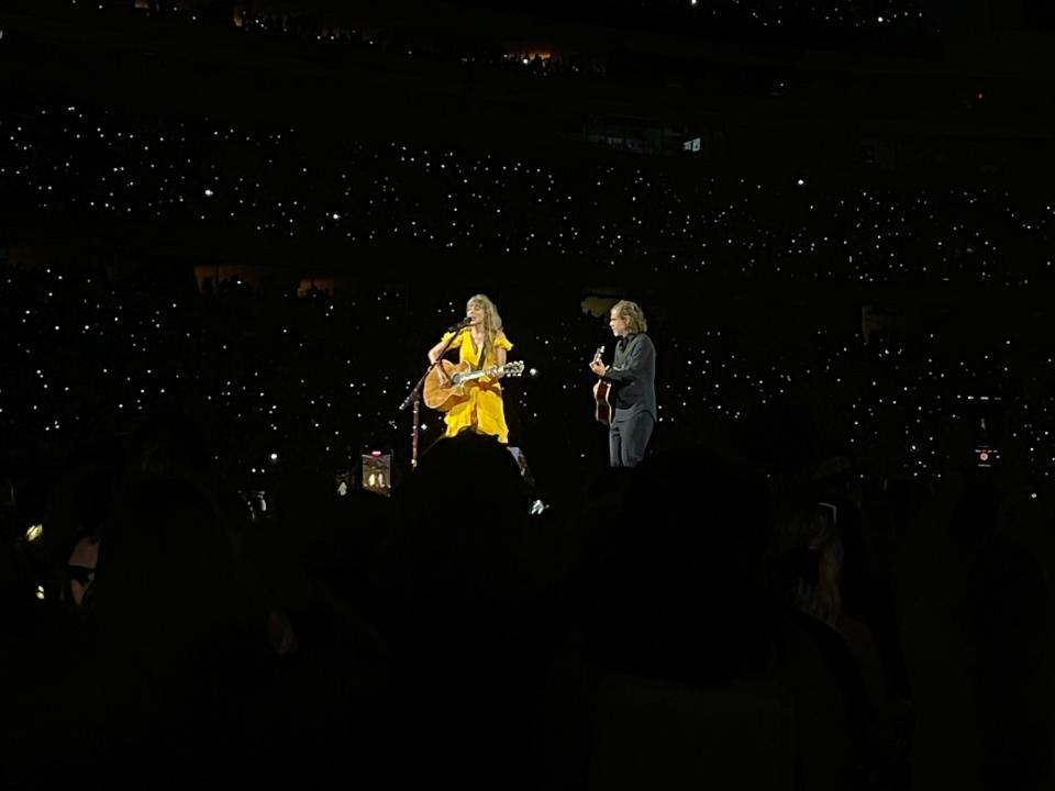 Taylor Swift and Aaron Dessner perform "Ivy" during Saturday's concert.