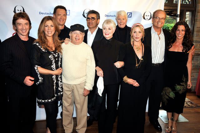 <p>Kevin Winter/Getty</p> Martin Short, Rita Wilson, Tom Hanks, Arte Johnson, Eugene Levy, Shirley Jones, Peter Graves, Christina Applegate, Kelsey Grammar and Alanis Morissette in May 2009.