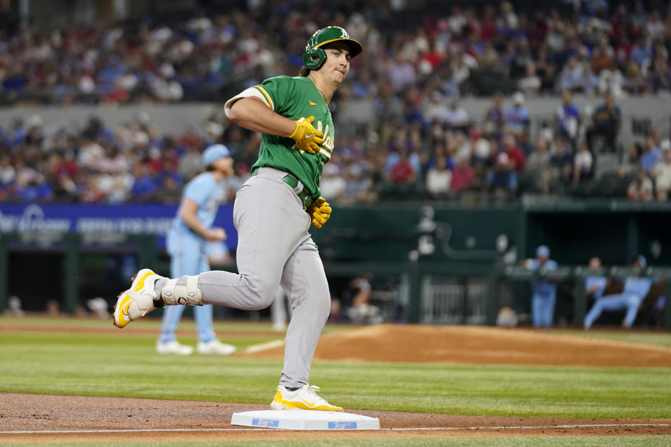 Oakland Athletics' Tyler Soderstrom celebrates his solo home run as he rounds third in the third inning of a baseball game against the Texas Rangers, Sunday, Sept. 10, 2023, in Arlington, Texas. (AP Photo/Tony Gutierrez)