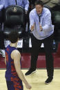 Clemson head coach Brad Brownell yells instructions to Clemson center PJ Hall (24) in the first half of an NCAA college basketball game against Florida State in Tallahassee, Fla., Saturday, Jan. 28, 2023. (AP Photo/Phil Sears)