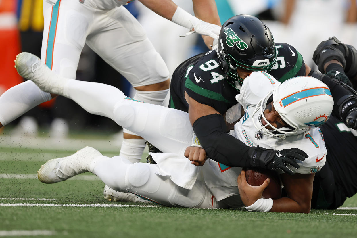 The Dolphins need to protect Tua Tagovailoa much better along the offensive line, which should be an area of focus in the NFL Draft. (Photo by Rich Schultz/Getty Images)