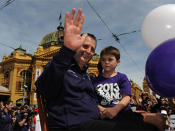  Fremantle coach Ross Lyon waves to the crowd during the Grand Final parade in Melbourne, Friday, Sept. 27, 2013. Photo: AAP