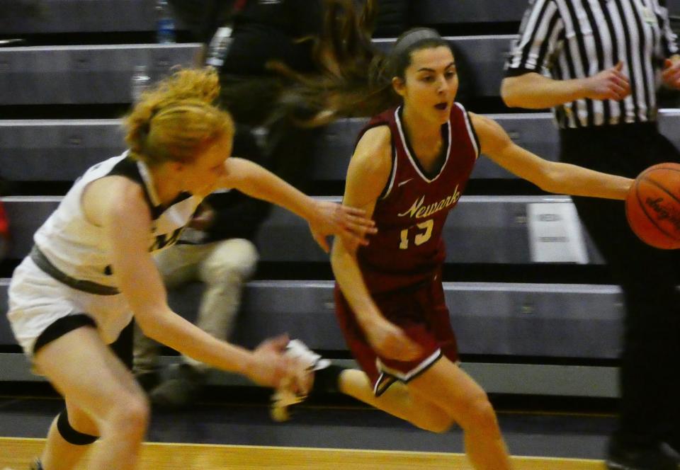 Newark senior Gwen Stare pushes in transition against IMG Academy during the Classic in the City at Pickerington Central on Saturday, Jan. 15, 2022. The Wildcats fell 54-37.