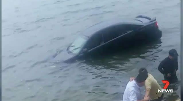 Witnesses jumped into the river to pull the driver to safety. Source: 7 News