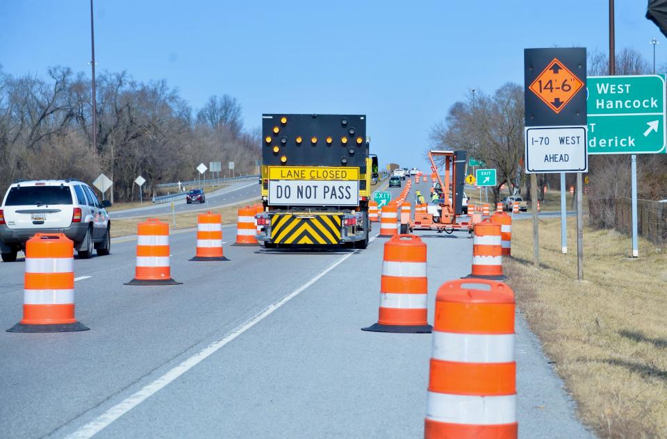 A Maryland State Highway contractor has begun work, setting up safety barriers for a project to improve the U.S. 40 bridge decks over Interstate 70. Here, traffic heads west towards the bridges and Hagerstown on Monday morning with westbound traffic on the bridge already restricted to one lane.