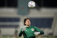 Goalkeeper Guillermo Ochoa attends the Mexico official training on the eve of the group C World Cup soccer match between Mexico and Poland, in Jor, Qatar, Monday, Nov. 21, 2022. (AP Photo/Moises Castillo)
