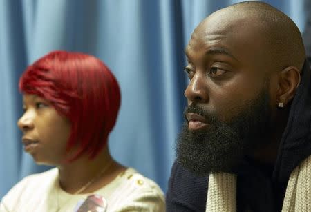 The mother, Lesley McSpadden (L) and father, Michael Brown Sr., of slain teenager Michael Brown, hold a news conference in Geneva November 12, 2014. REUTERS/Denis Balibouse