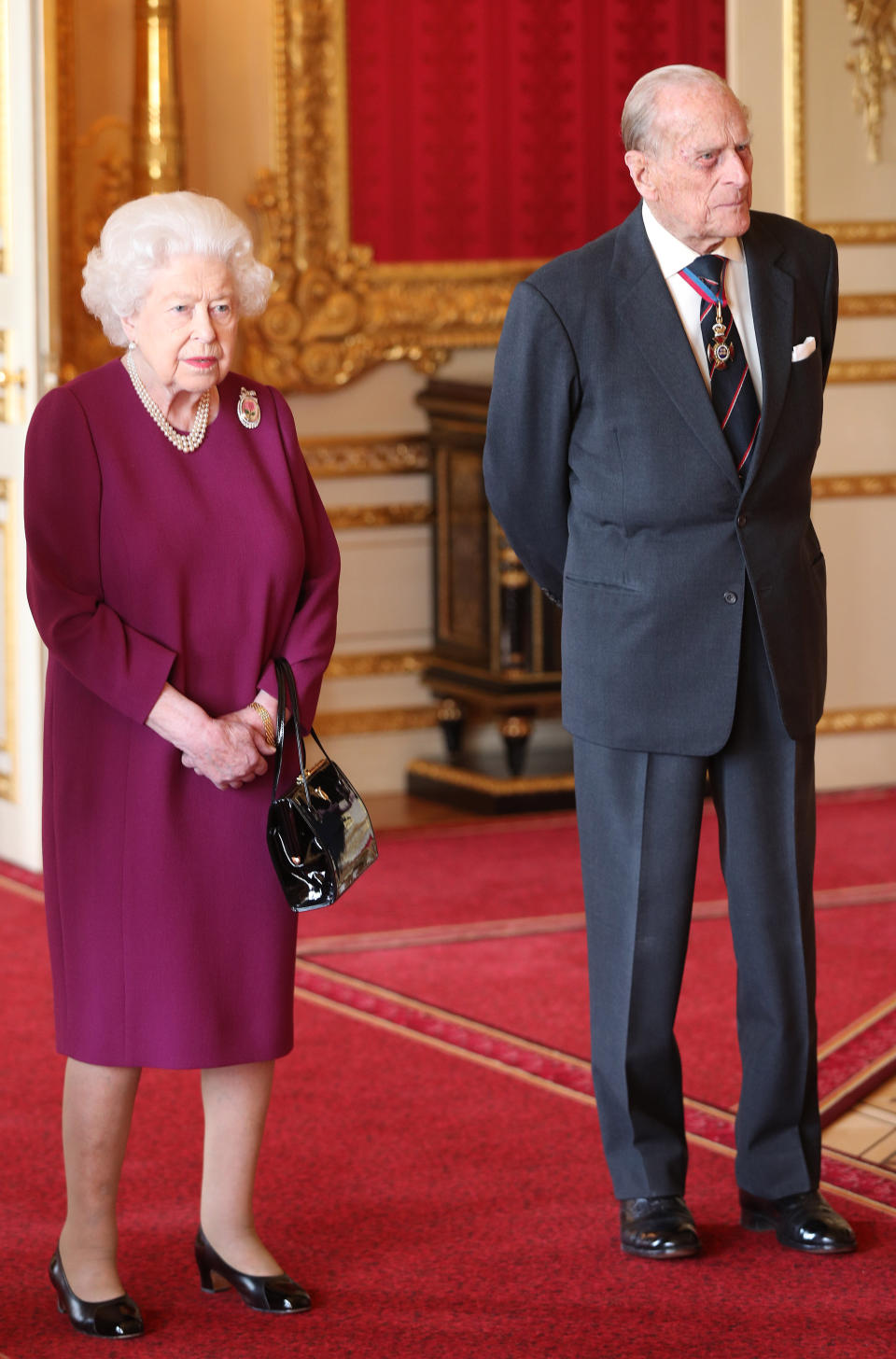 WINDSOR, ENGLAND - MAY 7: Queen Elizabeth II and Prince Philip, Duke of Edinburgh join members of the Order of Merit ahead of a luncheon at Windsor Castle on May 7, 2019 in Windosr, England. Established in 1902 by King Edward VII, The Order of Merit recognises distinguished service in the armed forces, science, art, literature, or for the promotion of culture. Admission into the order remains the personal gift of The Queen and is restricted to a maximum of 24 living recipients from the Commonwealth realms, plus a limited number of honorary members. (Photo by Jonathan Brady - WPA Pool/Getty Images)