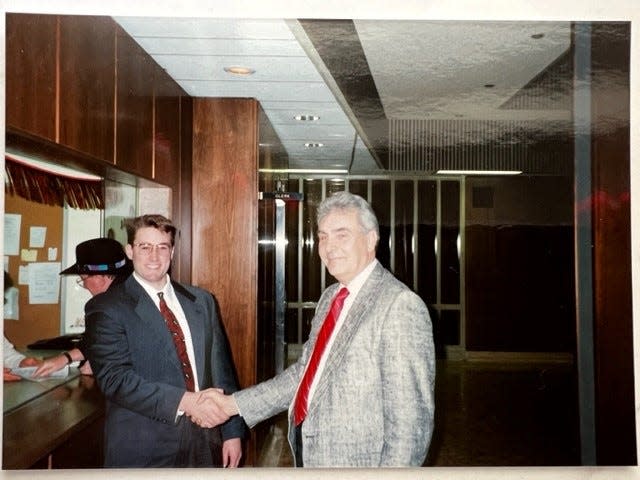 A young Jerry Habanek shakes the hand of Jim Lutz, Waukesha Police captain in charge of administration, early in 1994. Lutz took Habanek, now a WPD lieutenant, to be sworn in that day as a new Waukesha police officer. Lutz died several months later when he was shot while pursuing James and Theodore Oswald in Waukesha following an armed bank robbery in Wales.