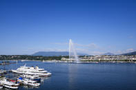 The fountain Jet d'eau in the Lake Geneva spray water, in Geneva, Switzerland Monday, June 14, 2021. The lakeside city known as a Cold War crossroads and a hub for Swiss discretion, neutrality and humanitarianism, is set to return to a spotlight on the world stage as U.S. President Joe Biden and Russian President Vladimir Putin come to town for a summit on Wednesday, June 16. (AP Photo/Markus Schreiber)