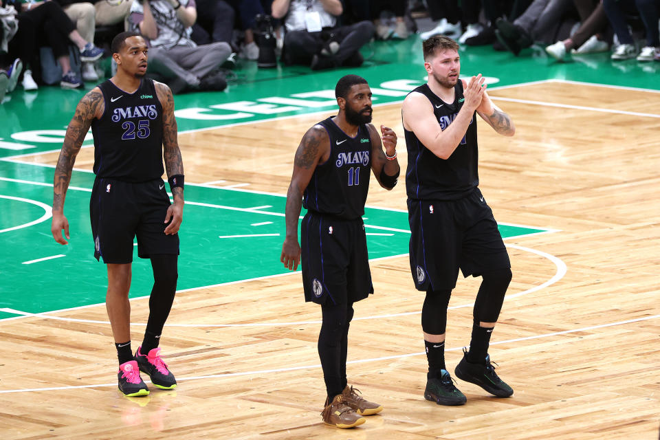 BOSTON, MASSACHUSETTS - JUNE 06: Luka Doncic #77 and Kyrie Irving #11 of the Dallas Mavericks react during the third quarter against the Boston Celtics in Game One of the 2024 NBA Finals at TD Garden on June 06, 2024 in Boston, Massachusetts. NOTE TO USER: User expressly acknowledges and agrees that, by downloading and or using this photograph, User is consenting to the terms and conditions of the Getty Images License Agreement. (Photo by Adam Glanzman/Getty Images)