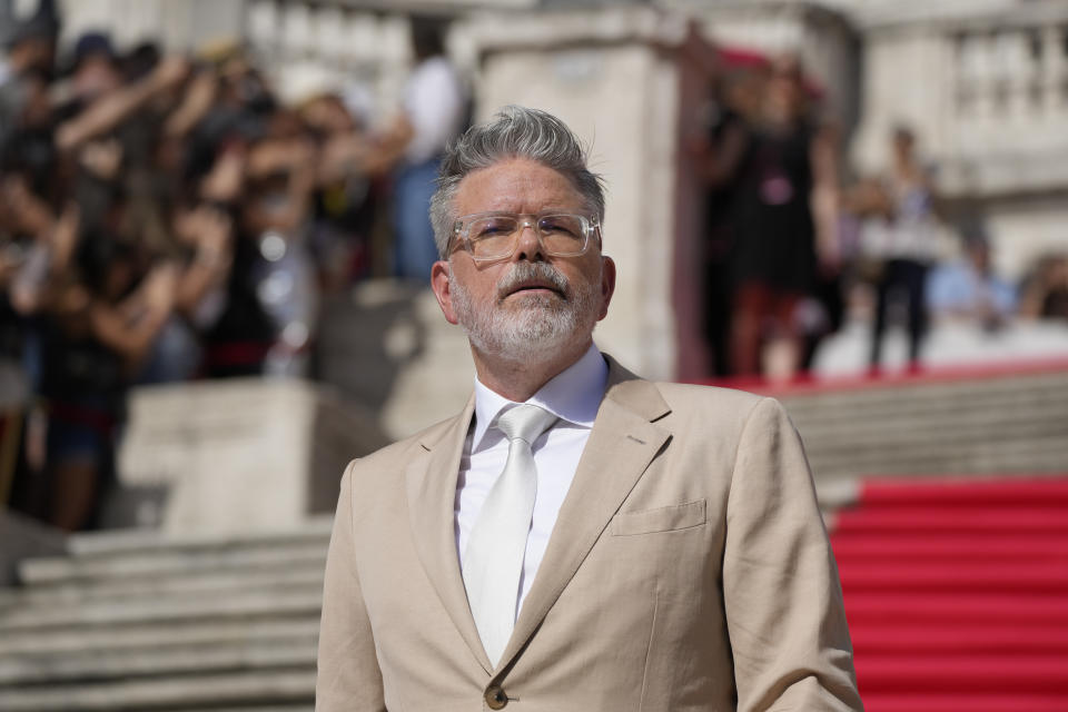 Director Chris McQuarrie poses for photographers on the red carpet of the world premiere for the movie "Mission: Impossible - Dead Reckoning" at the Spanish Steps in Rome Monday, June 19, 2023. (AP Photo/Alessandra Tarantino)