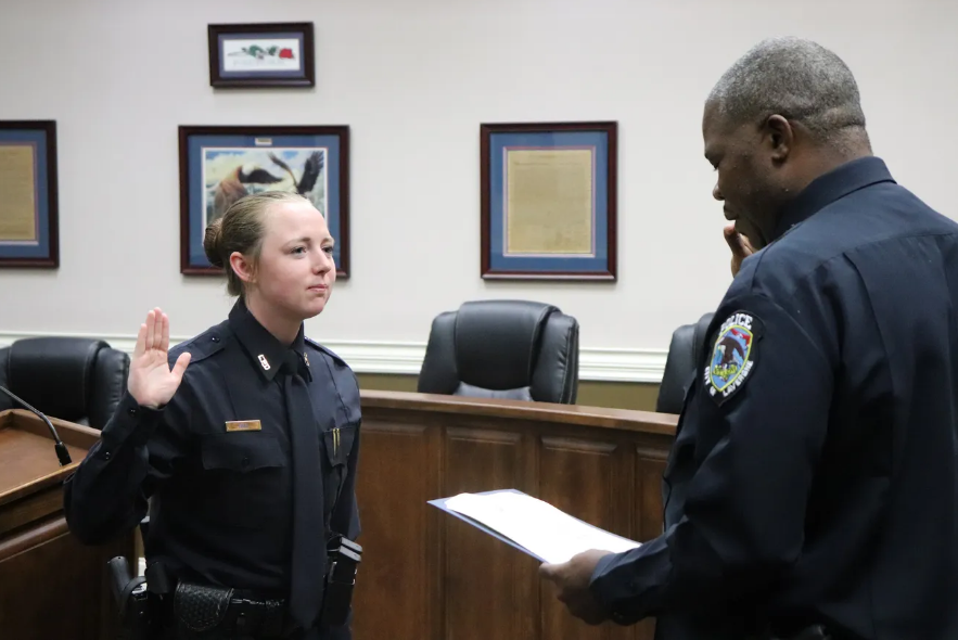 This La Vergne government photo photo from August 2021 shows then police officer Meagan Hall taking her oath of office.