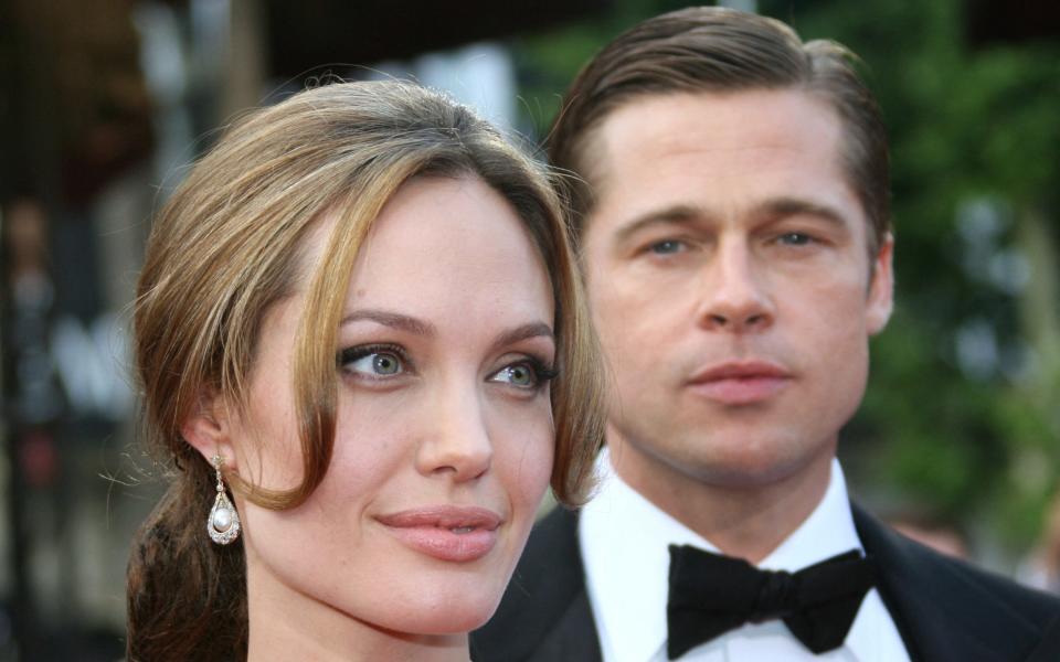 American actress Angelina Jolie and actor and producer Brad Pitt pose on May 21, 2007 in Cannes, South of France,