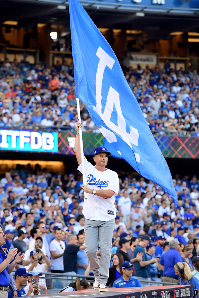 <p>The devoted fan waved a Los Angeles Dodgers flag before Game 1 of the 2017 World Series between the Houston Astros and the Dodgers at Dodger Stadium on Tuesday. And it looks like Lowe brought his team some good luck. The hometown squad came out on top 3-1, taking the lead in the best-of-seven series. (Photo: Harry How/Getty Images) </p>