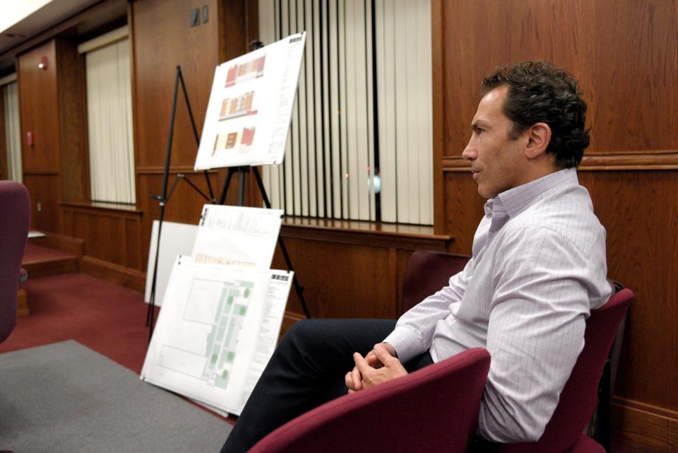 Michael Salerno, developer for 121 Monmouth St., listens during a meeting of the Red Bank zoning board on Thursday, May 19, 2022 in Red Bank, New Jersey. 