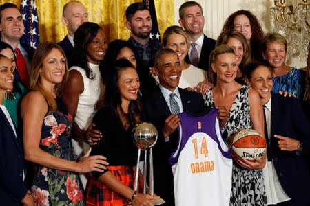 President Barack Obama poses with members of the Phoenix Mercury at a ceremony honoring the 2014 WNBA champion Mercury in the East Room at the White House. Mandatory Credit: Geoff Burke-USA TODAY Sports