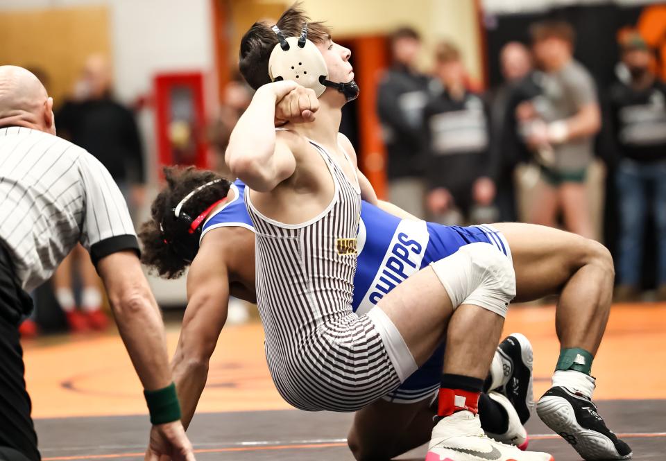 Waynedale's Caden Schmeltzer locks in this arm bar and prepares to take Chippewa's Cameron Davis to the mat.