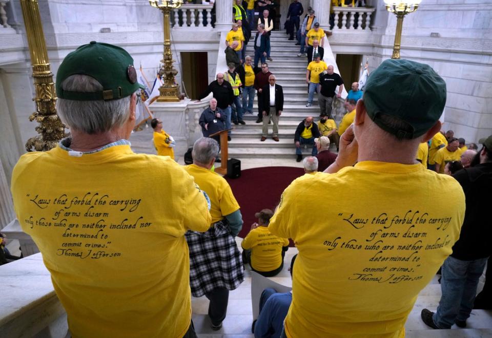 Around 100 gun-rights supporters gather for a rally in the RI State House rotunda last Wednesday afternoon as day two of gun legislation hearings continued.