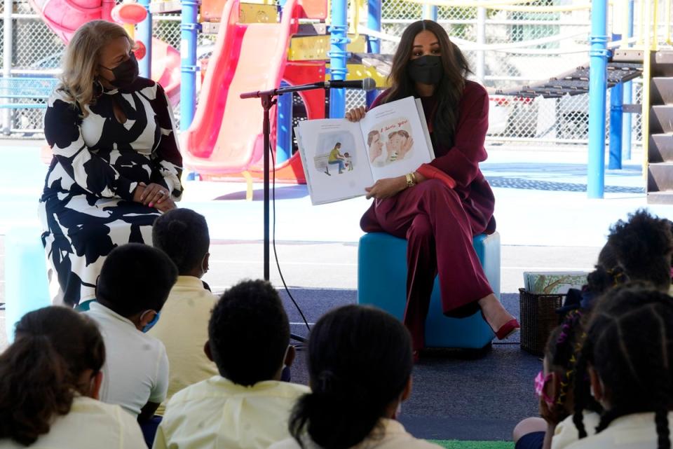 Meghan, the Duchess of Sussex, reads from her book The Bench during her visit with Prince Harry, to PS 123, the Mahalia Jackson School, in New York’s Harlem neighbourhood (Richard Drew/AP) (AP)