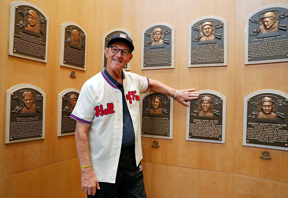 Jim Kaat stands next to the plaque of Lefty Grove, his father's favorite player.