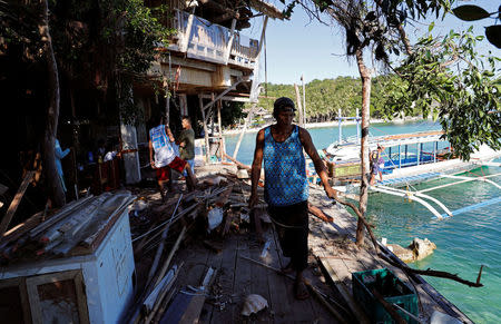 Workers dismantle Spider resort, two days before the temporary closure of the holiday island Boracay, in the Philippines April 24, 2018. REUTERS/Erik De Castro