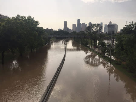 Flood waters cover Memorial Drive along Buffalo Bayou in Houston, Texas May 26, 2015 in a photo provided by the Harris County Flood Control District. REUTERS/Harris County Flood Control District/handout via Reuters