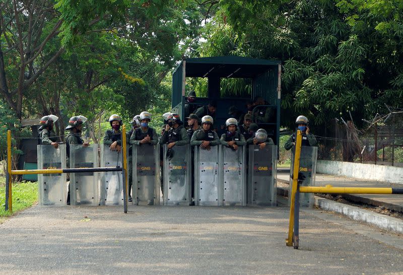 Relatives of inmates protest outside Los Llanos penitentiary after a riot erupted inside the prison leaving dozens of dead as the spread of the coronavirus disease (COVID-19) continues in Guanare