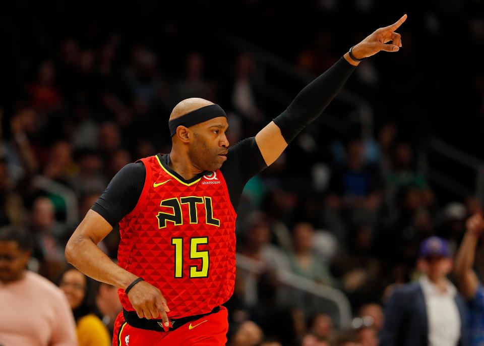 ATLANTA, GEORGIA - MARCH 13:  Vince Carter #15 of the Atlanta Hawks reacts after hitting a three-point basket against the Memphis Grizzlies in the first half at State Farm Arena on March 13, 2019 in Atlanta, Georgia.  NOTE TO USER: User expressly acknowledges and agrees that, by downloading and or using this photograph, User is consenting to the terms and conditions of the Getty Images License Agreement. (Photo by Kevin C.  Cox/Getty Images)