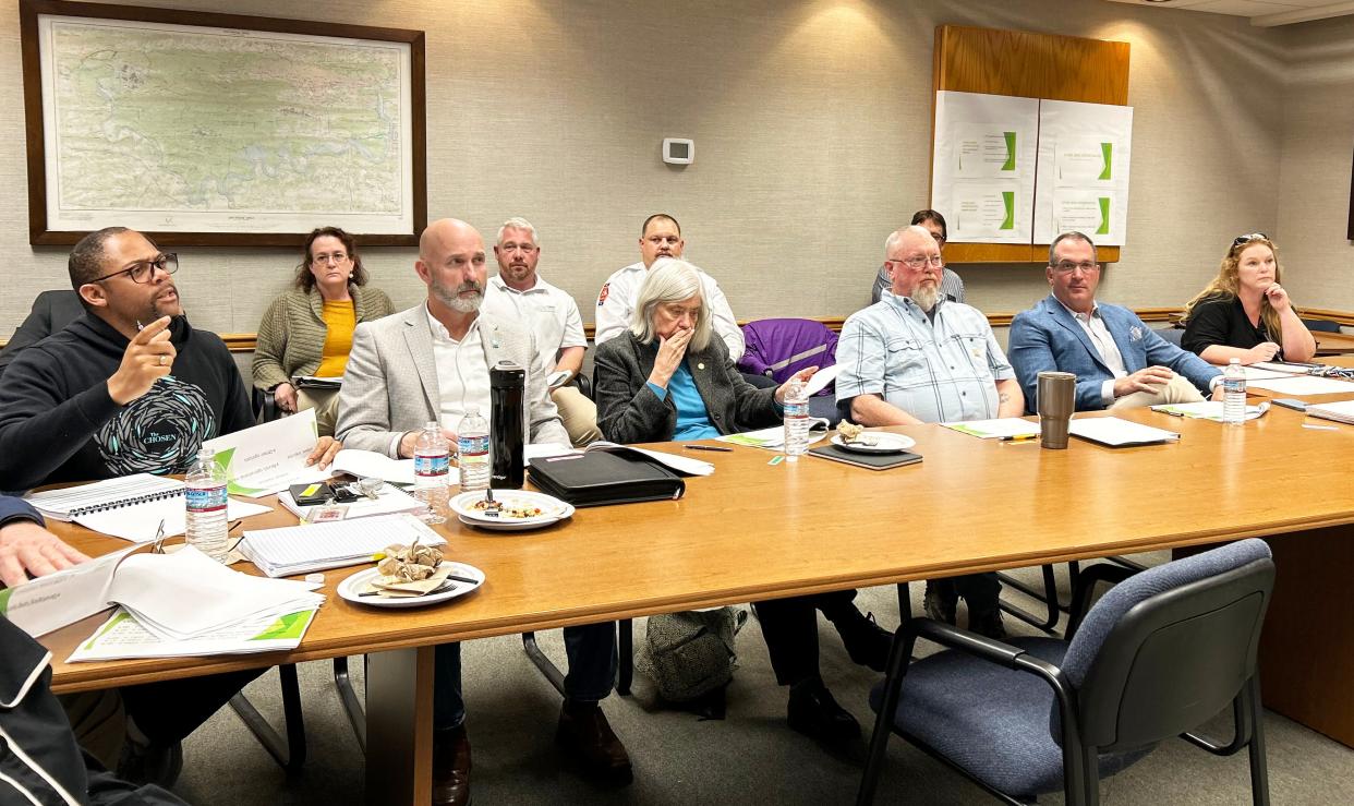 Oak Ridge City Council member Derrick Hammond, from left, makes a point during a budget work session in the Municipal Building training room on April 8, 2024. Seated next to Hammond, from left, are Mayor Pro Tem Jim Dodson, and council members Ellen Smith, Chuck Hope and Sean Gleason. Not pictured are Mayor Warren Gooch and council member Charlie Hensley, who were also present.