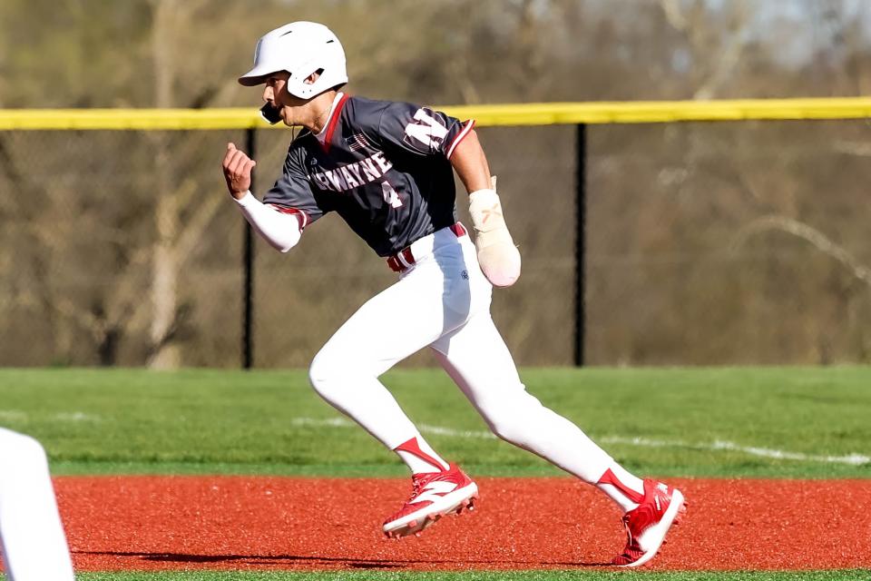 Norwayne senior Beau Polen is off to the races here as he looks to advance on the base paths.