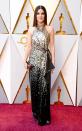 <p>Sandra Bullock wows fans in a shimmery dress designed by Louis Vuitton.</p>