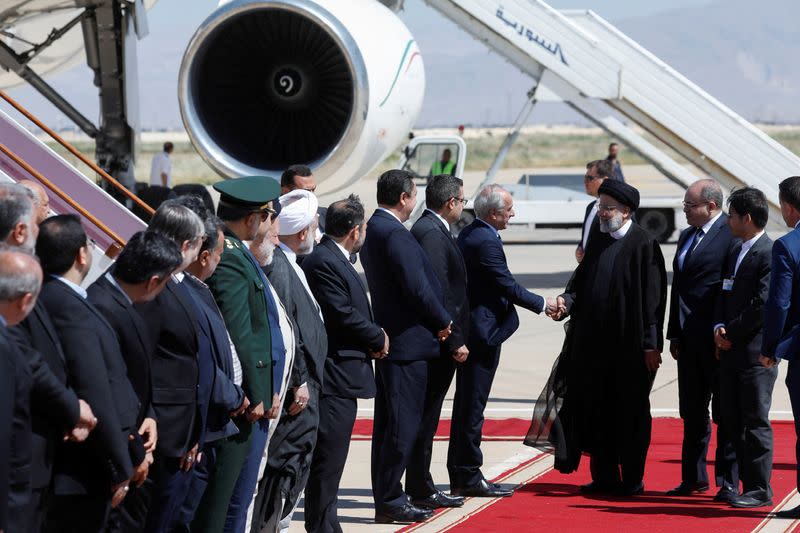 Iranian President Ebrahim Raisi is welcomed upon arrival at Damascus airport