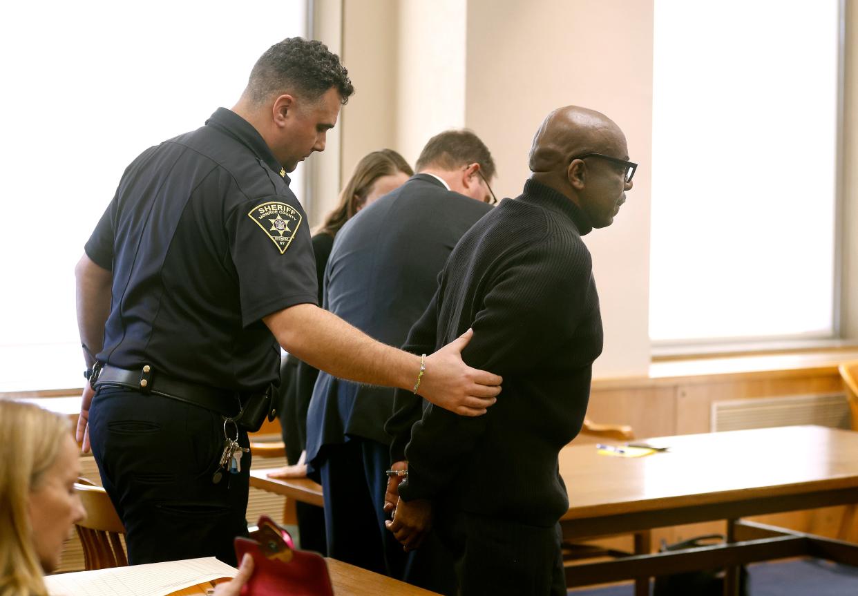 Timothy Williams is led away in handcuffs after being convicted of the rape and murder of Wendy Jerome in 1984.