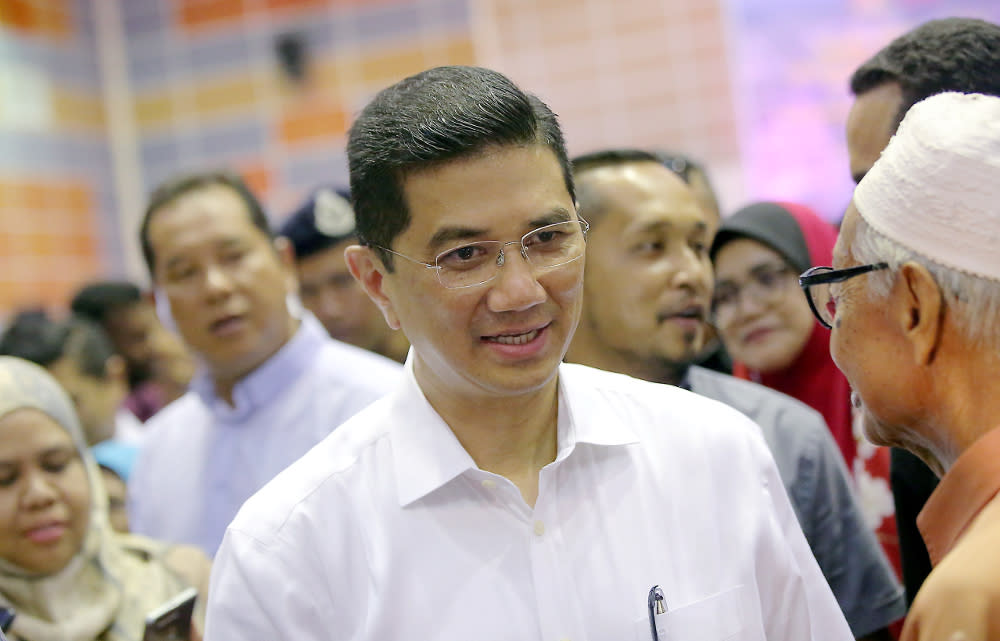 Economic Affairs Minister Datuk Seri Azmin Ali speaks to the press after visiting Felcra residents at the Dewan Besar Seberang Perak, Kampung Gajah July 22, 2019. — Picture by Farhan Najib