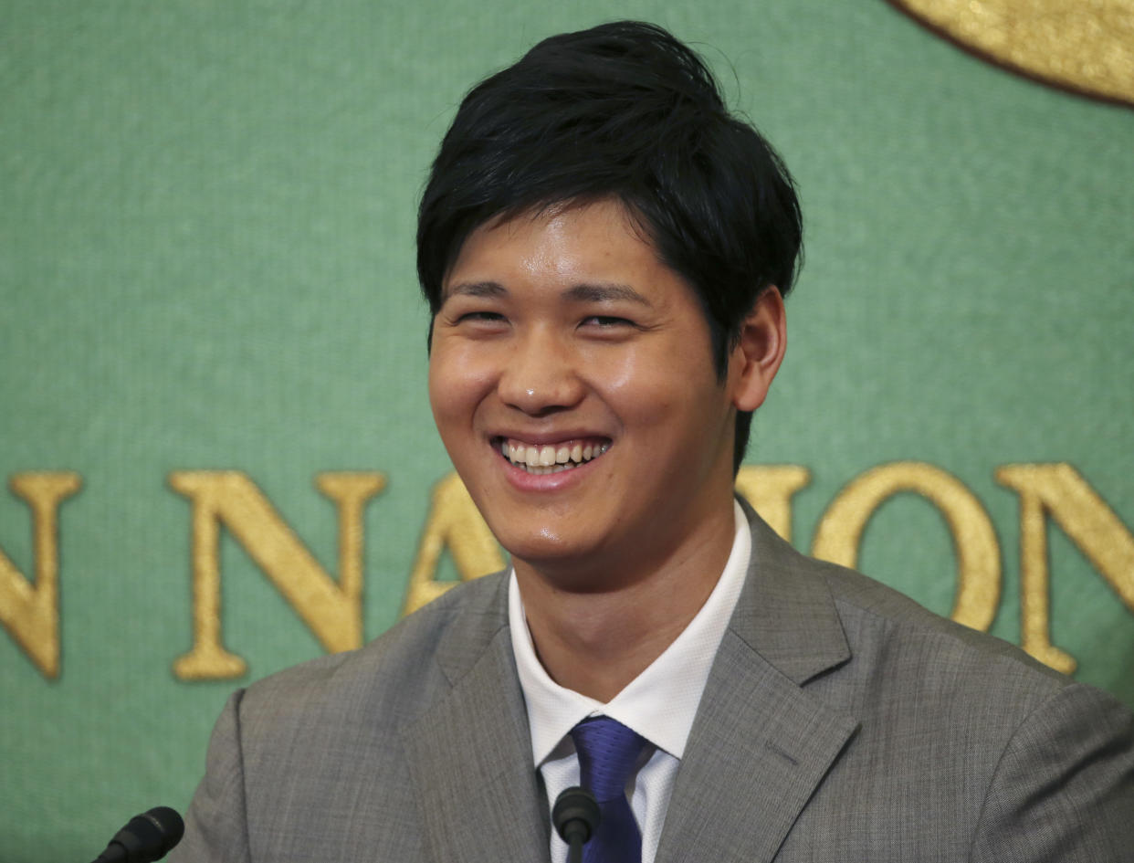 Shohei Ohtani is willing to listen to pitches from every team. (AP Photo/Koji Sasahara)