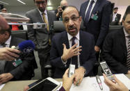 Khalid Al-Falih Minister of Energy, Industry and Mineral Resources of Saudi Arabia speaks prior to the start of a meeting of the Organization of the Petroleum Exporting Countries, OPEC, at their headquarters in Vienna, Austria, Thursday, Dec. 6, 2018. (AP Photo/Ronald Zak)