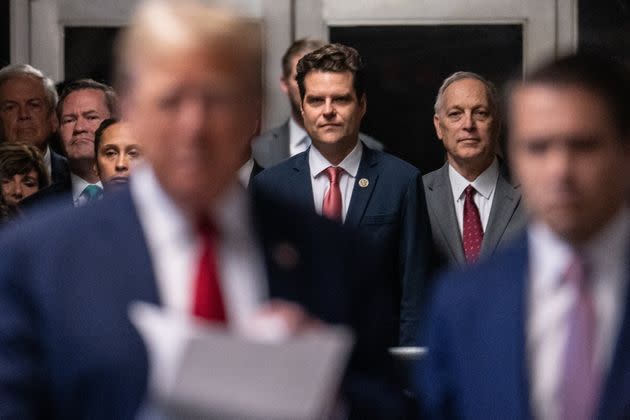 "I'm in the shot, I'M IN THE SHOT!" -- something Rep. Matt Gaetz (R-Fla.) probably said in his head as he positioned himself to appear in a photo with Donald Trump at the former president's criminal hush money trial. <span class="copyright">JEENAH MOON via Getty Images</span>
