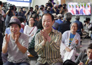 <p>At the Seoul Railway Station, people celebrate as they watch the news of President Trump meeting with North Korean leader Kim Jong Un on Tuesday. (Photo: Kyodo News via AP) </p>