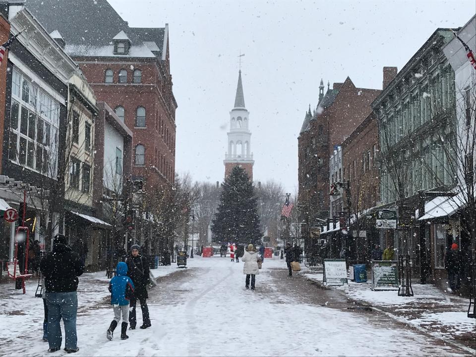 Snow fulfills Christmas dreams as shopping continues on Church Street in Burlington, Vermont, on Dec. 24, 2018.