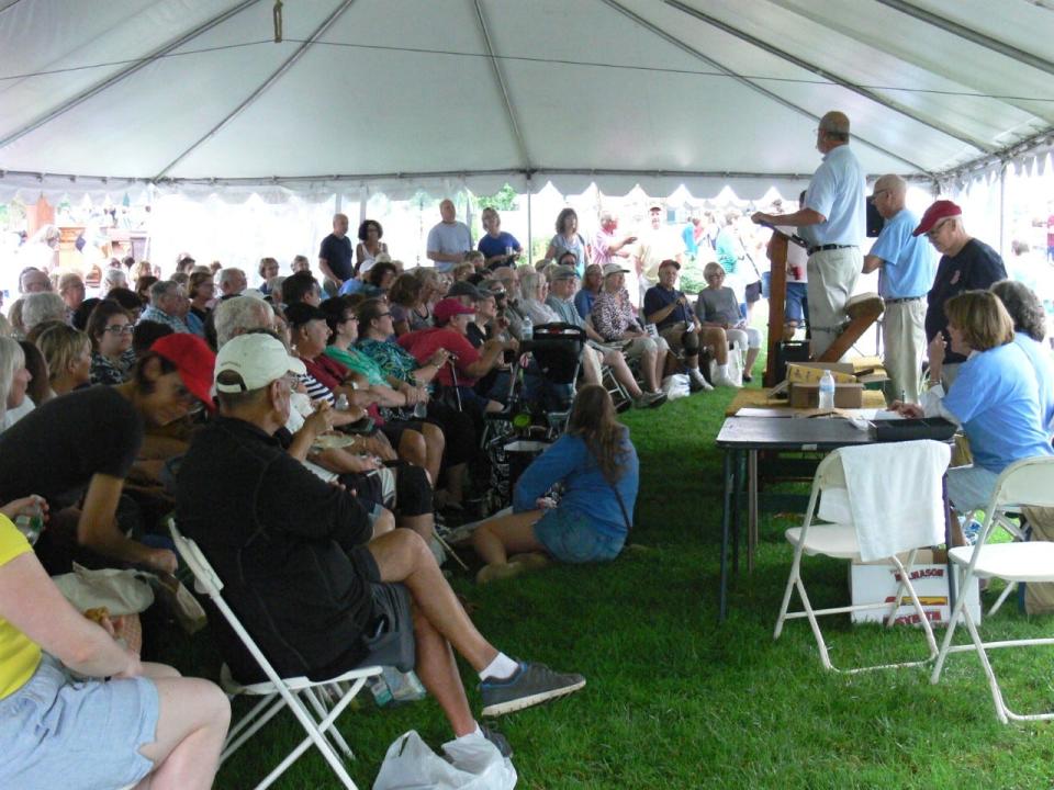 A scene from a past Dennis Union Church auction. The event will take place this year on Aug. 13.