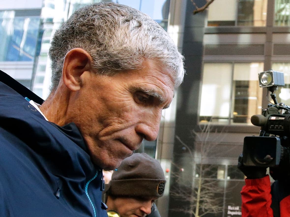 In this March 12, 2019, photo, William (Rick) Singer, founder of the Edge College & Career Network, departs federal court in Boston after pleading guilty to charges in a nationwide college admissions bribery scandal.  (Steven Senne/The Associated Press - image credit)