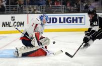 February 18, 2019; Los Angeles, CA, USA; Washington Capitals goaltender Pheonix Copley (1) blocks a shot against Los Angeles Kings left wing Austin Wagner (51) during the second period at Staples Center. Mandatory Credit: Gary A. Vasquez-USA TODAY Sports