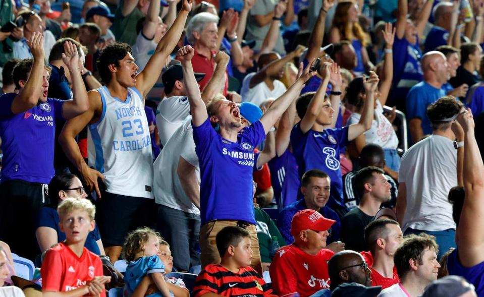 Chelsea fans celebrate a goal during the second half of Chelsea Football Club’s 5-0 victory over Wrexham AFC in a friendly match at Kenan Stadium in Chapel Hill, N.C., Wednesday, July 19, 2023.