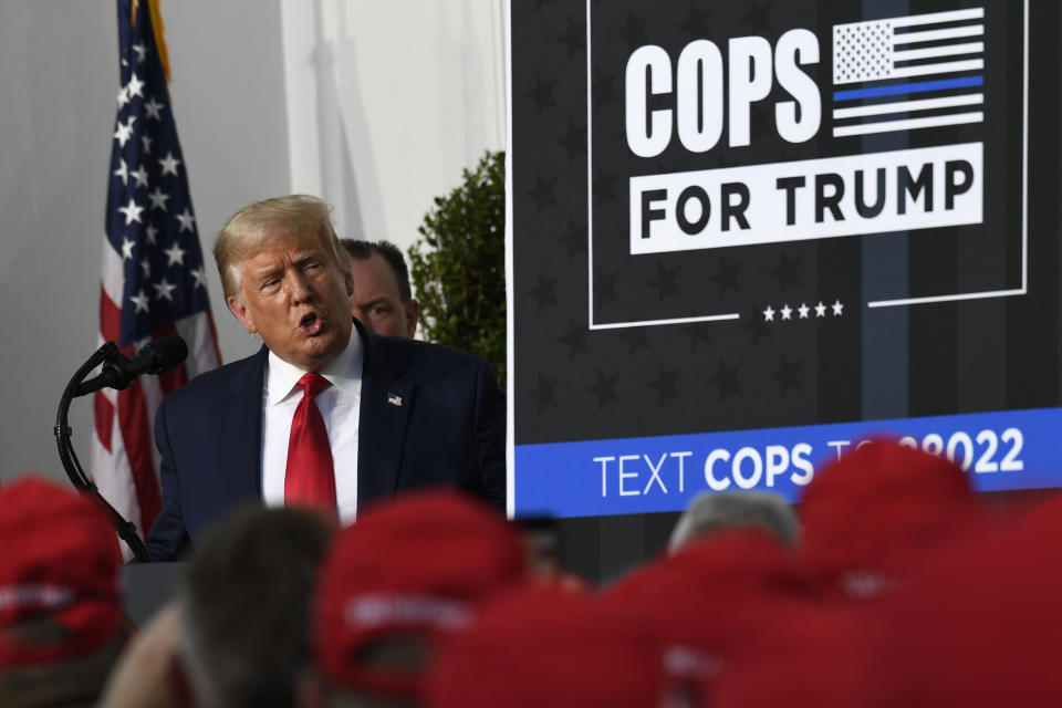 President Donald Trump speaks during an event Trump National Golf Club, Friday, Aug. 14, 2020, in Bedminster, N.J., with members of the City of New York Police Department Benevolent Association. (AP Photo/Susan Walsh)