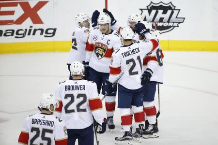 Feb 9, 2019; Washington, DC, USA; The Florida Panthers celebrates after Florida Panthers left wing Mike Hoffman (68) scores the game winning goal against the Washington Capitals in overtime at Capital One Arena. Mandatory Credit: Amber Searls-USA TODAY Sports