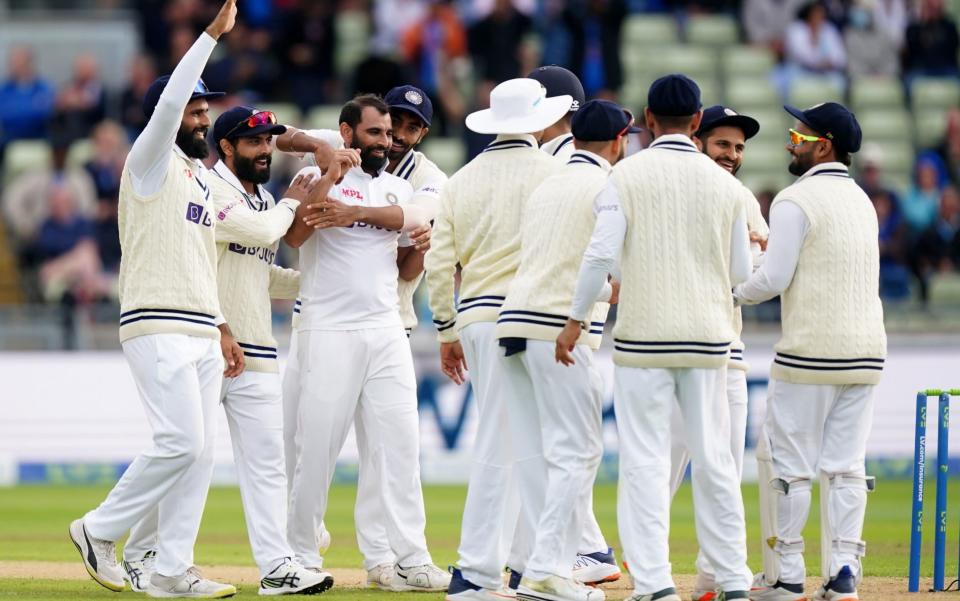 Mohammed Shami celebrates taking the wicket of Jack Leach - &nbsp;PA
