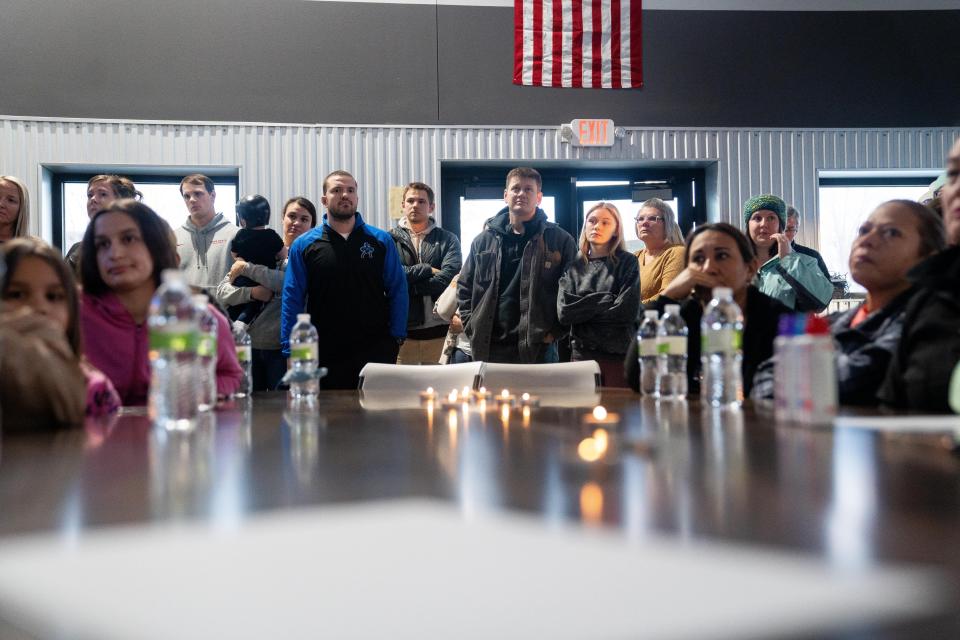 Community members gather as they honor the victims of a shooting at Perry High School Thursday, Jan. 4, 2024, at Progressive Foundry.