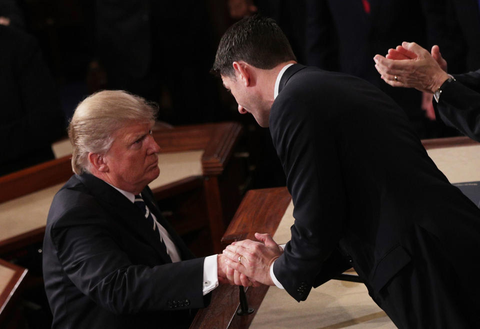 <p>President Donald Trump shakes hands with House Speaker Rep. Paul Ryan (R-WI) after addressing a joint session of the U.S. Congress on February 28, 2017 in the House chamber of the U.S. Capitol in Washington, DC. Trump’s first address to Congress focused on national security, tax and regulatory reform, the economy, and healthcare. (Alex Wong/Getty Images) </p>