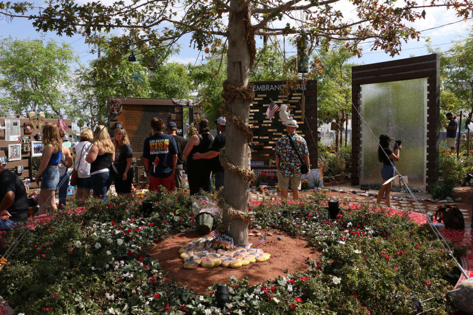 Las Vegas remembers the mass shooting one year later on Oct. 1, 2018.  People gather to pay their respects at the Las Vegas Healing Garden.